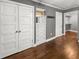 Bedroom features built-in dresser and storage closet leading into walk-in closet at 209 E 4Th S St, Summerville, SC 29483