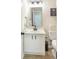 Powder room with modern vanity, sleek faucet, mirror and toilet at 215 Evesham Dr, Summerville, SC 29485