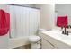 Bathroom with white cabinets, white shower curtain and a red towel at 215 Evesham Dr, Summerville, SC 29485