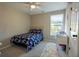 Bedroom features natural light, ceiling fan and neutral paint at 215 Evesham Dr, Summerville, SC 29485
