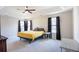 Primary bedroom with tray ceiling and neutral carpet at 215 Evesham Dr, Summerville, SC 29485