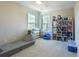 Bright bedroom with lots of natural light, ceiling fan and cubby shelves at 215 Evesham Dr, Summerville, SC 29485