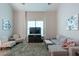 Comfortable living room with a large window, plush rug, and modern decor at 215 Evesham Dr, Summerville, SC 29485
