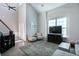 Bright living room with high ceilings, modern decor, and comfortable seating area at 215 Evesham Dr, Summerville, SC 29485