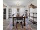 Charming dining room featuring a wood table, stylish decor, and bright natural light at 219 Border Rd, Goose Creek, SC 29445