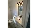 Stylish bathroom with a white vanity, modern fixtures, and a tiled shower at 2219 N Dallerton Cir, Charleston, SC 29414