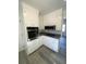 Modern kitchen featuring stainless steel appliances, granite counters, and white cabinets at 2219 N Dallerton Cir, Charleston, SC 29414