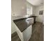 Updated kitchen with granite countertops, a modern faucet, and stainless steel appliances at 2219 N Dallerton Cir, Charleston, SC 29414