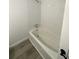 Bathroom showcasing a tile shower with a new shower head and tiled walls at 2219 N Dallerton Cir, Charleston, SC 29414