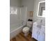 Clean bathroom featuring a tub shower combination, modern vanity, and hardwood floors at 222 Braly Dr, Summerville, SC 29485