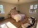 Comfortable bedroom with hardwood floors, soft lighting, and modern furnishings at 222 Braly Dr, Summerville, SC 29485