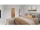 Bright bedroom features neutral tones and ensuite bathroom access for added convenience at 223 West Bradford Pointe Dr, Summerville, SC 29486