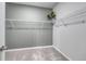 Spacious walk-in closet features multiple shelves, offering plenty of storage space at 223 West Bradford Pointe Dr, Summerville, SC 29486