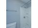 Clean bathroom with a shower stall featuring a white surround and a standard white toilet at 2494 Etiwan Ave # B-4, Charleston, SC 29414