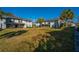 Exterior view of a multi-Gathering residential neighborhood on a sunny day with mature landscaping at 2494 Etiwan Ave # B-4, Charleston, SC 29414