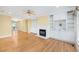 Comfortable living room with a fireplace, built-in shelving, and natural light, perfect for relaxing at 2734 Old Forest Drive, Seabrook Island, SC 29455