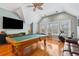 Spacious game room with a pool table and hardwood floors at 3004 Riverwood Dr, Mount Pleasant, SC 29466