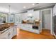 Spacious kitchen features white cabinets, stainless steel appliances, and granite countertops providing ample meal prep area at 3004 Riverwood Dr, Mount Pleasant, SC 29466