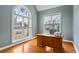Bright office boasts two large windows, hardwood floors, and ample space for a workspace at 3004 Riverwood Dr, Mount Pleasant, SC 29466