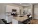 Modern kitchen features granite countertops, stainless appliances, and a center island at 304 Pine Crest View Dr, Summerville, SC 29486