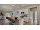 Open-concept kitchen with granite countertops, stainless appliances, and seating at island at 304 Pine Crest View Dr, Summerville, SC 29486