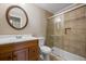Bathroom with a shower, neutral tile, and sleek vanity, offering a comfortable space at 305 Meadowlark Ln, Moncks Corner, SC 29461