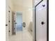 Bathroom features a glass shower door, white tile, and a double-door linen closet at 306 O'Malley Dr, Summerville, SC 29483