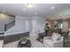 Open-concept living room featuring hardwood floors and easy access to the kitchen and dining area at 306 O'Malley Dr, Summerville, SC 29483