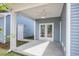 Covered outdoor patio featuring a ceiling fan and access to the backyard at 306 O'Malley Dr, Summerville, SC 29483