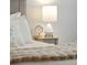 Close up of the lamp and clock in the main bedroom at 3066 Penny Ln, Johns Island, SC 29455