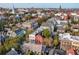 Picturesque aerial view highlighting a charming neighborhood with historic architecture and mature trees at 32 Tradd St, Charleston, SC 29401