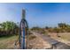 Beach boardwalk featuring outdoor shower and mature dune vegetation at 3408 Palmetto Blvd, Edisto Island, SC 29438