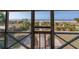 Scenic view from a screened porch overlooking a sandy path to the beach and ocean at 3408 Palmetto Blvd, Edisto Island, SC 29438