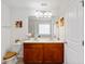 Bathroom with double sink vanity and custom wood cabinetry at 3426 Kirkwall Dr, Summerville, SC 29485
