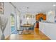 Cozy dining area with modern table set and sliding glass doors to the backyard at 3426 Kirkwall Dr, Summerville, SC 29485