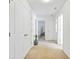 Hallway with multiple doors and neutral-colored carpet at 3426 Kirkwall Dr, Summerville, SC 29485