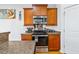 Well-equipped kitchen features stainless steel appliances and dark countertop at 3426 Kirkwall Dr, Summerville, SC 29485