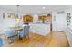 Open-concept kitchen and dining area featuring stylish decor and stainless steel appliances at 3426 Kirkwall Dr, Summerville, SC 29485