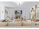 Comfortable living room with a plush sofa, decorative accents, and a cozy fireplace at 3426 Kirkwall Dr, Summerville, SC 29485