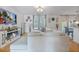 Bright living room featuring a large sectional couch, decorative fireplace, and ample natural light at 3426 Kirkwall Dr, Summerville, SC 29485
