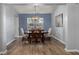 Formal dining room featuring hardwood floors, and a modern chandelier at 407 Squire Pope Rd, Summerville, SC 29486