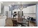 Spacious kitchen with stainless steel appliances, eat-in dining area, and modern finishes at 407 Squire Pope Rd, Summerville, SC 29486