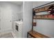 Laundry room with washer, dryer, coat rack, and bench at 407 Squire Pope Rd, Summerville, SC 29486