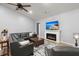 Comfortable living area with a fireplace, TV, ample seating, and contemporary decor for modern living at 407 Squire Pope Rd, Summerville, SC 29486