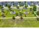 Aerial view of the community playground featuring play structures and green space for play at 407 Squire Pope Rd, Summerville, SC 29486