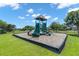 Community playground with a play structure, slide, and soft landing surface at 407 Squire Pope Rd, Summerville, SC 29486