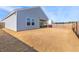 View of the home's spacious backyard with a privacy fence at 454 Pender Woods Dr, Summerville, SC 29486