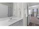Well-lit bathroom featuring a modern sink and a glimpse into the Bedroom at 454 Pender Woods Dr, Summerville, SC 29486
