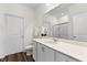Clean, modern bathroom with white cabinetry, a spacious countertop, and a large mirror at 454 Pender Woods Dr, Summerville, SC 29486
