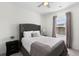 Comfortable bedroom featuring a tufted headboard, neutral bedding, and natural light at 454 Pender Woods Dr, Summerville, SC 29486